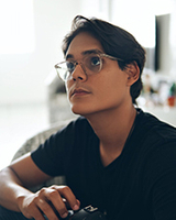 Darren, détaillant d"optique en Malaisie